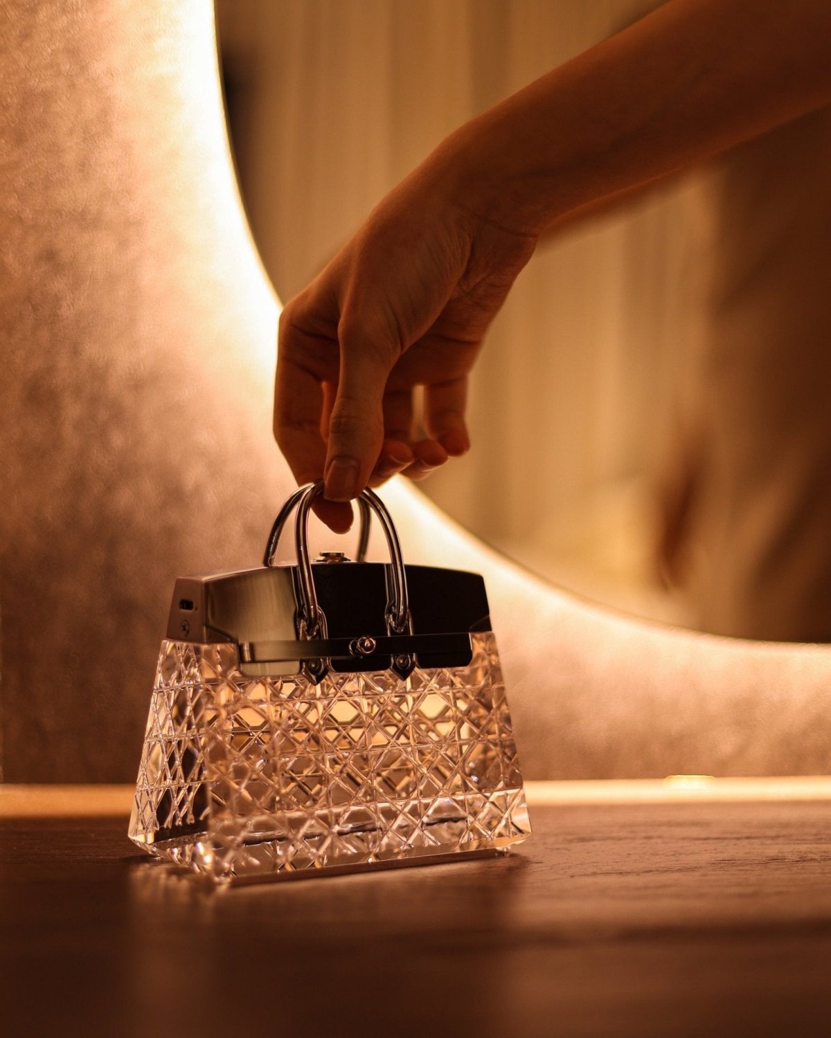 Borsaia handbag sculpture carved from a single block of crystal
