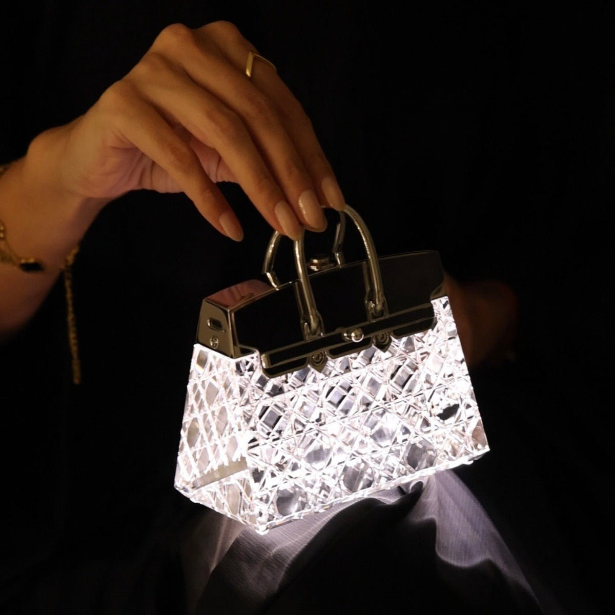 Borsaia handbag sculpture carved from a single block of crystal