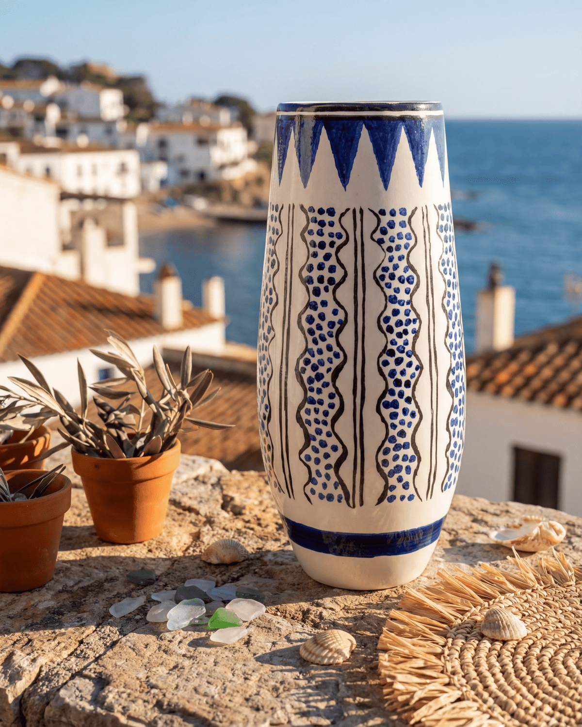 Azzaria white ceramic vase with hand-painted blue geometric pattern