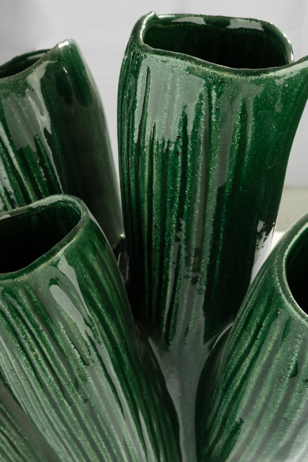 Smeraldita green ceramic vase of five hand-carved columns